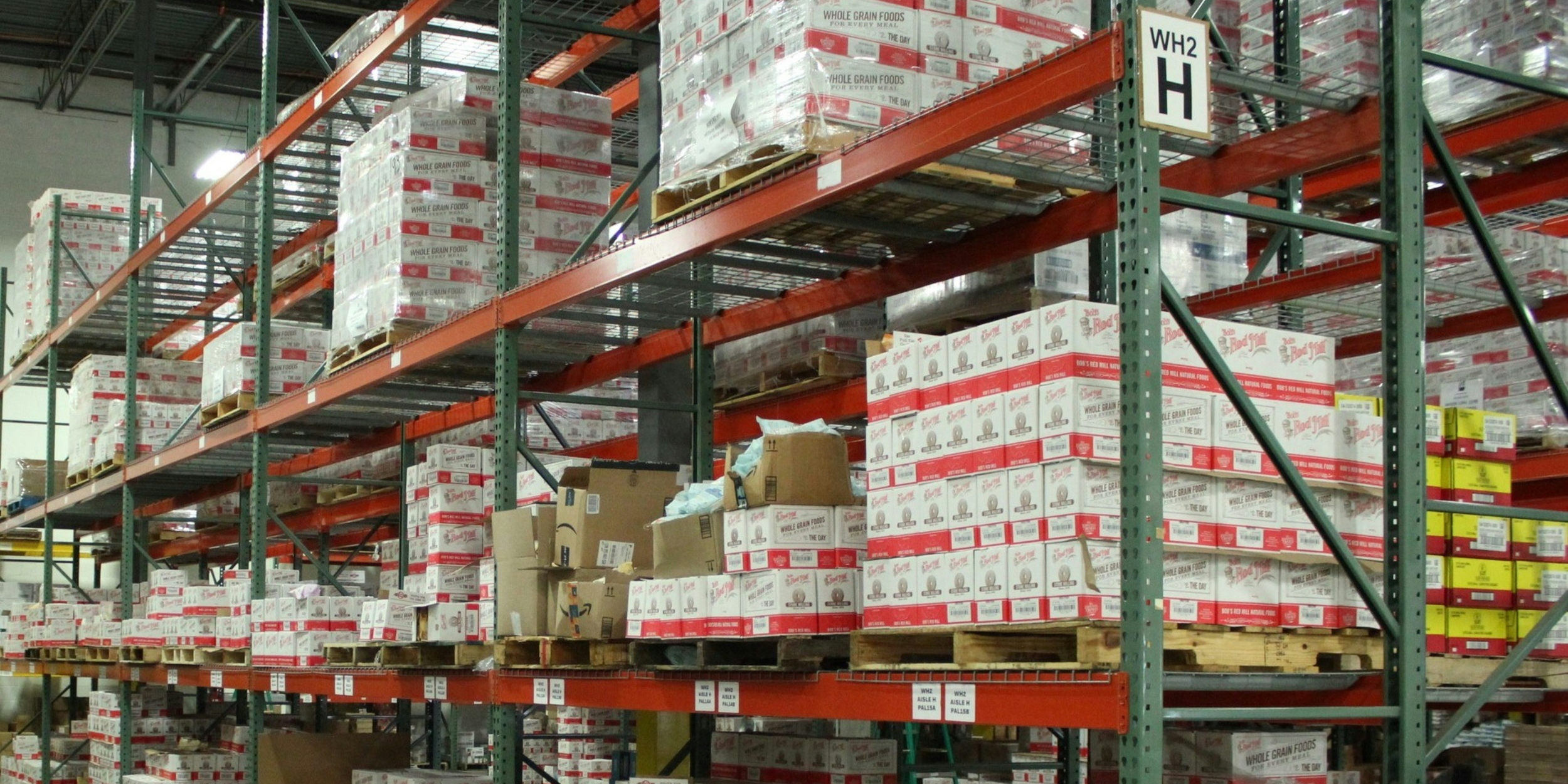 large warehouse with shelves full of inventory