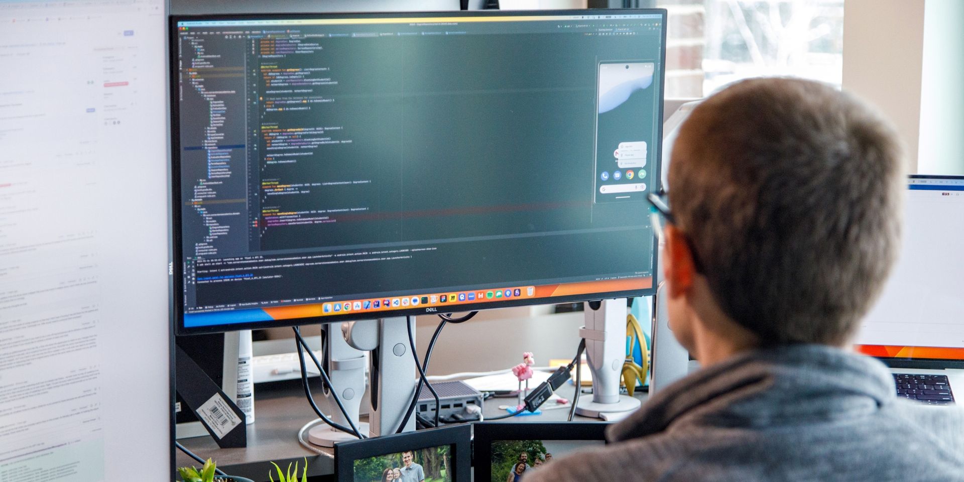 developer works on his computer at desk
